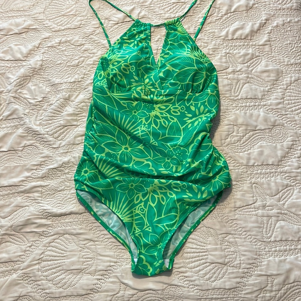 Very cute swimsuit in size 18W. Looks great on, just a bit small busted for me.
